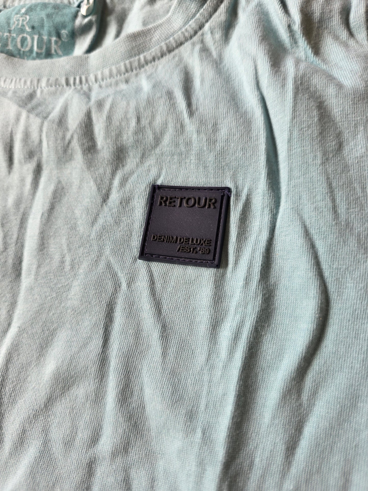 Retour tshirt maat 122/128