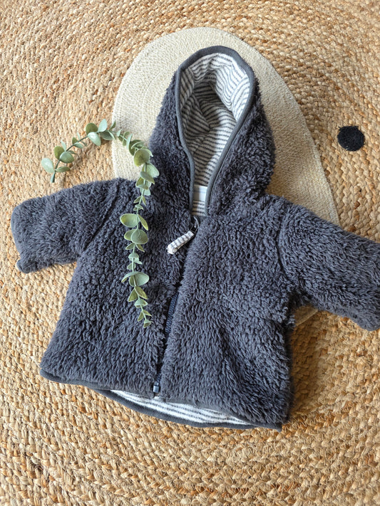 Feetje vestje maat 56